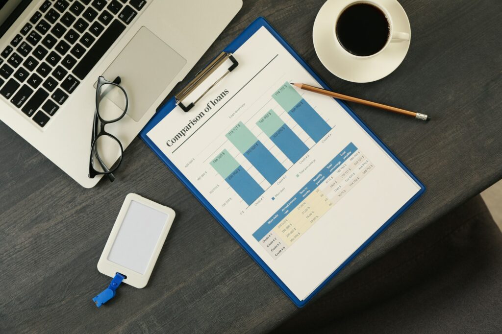 Concept of finance planning on black wooden table